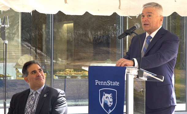 President Barron speaks while Justin Schwartz looks on