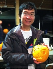 Student holding pumpkin at Shavers Creek pumpkin carving