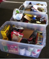 Thanksgiving baskets lined up with donated items.