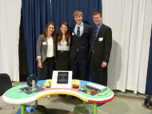 Design Team surrounding Vlad's Table